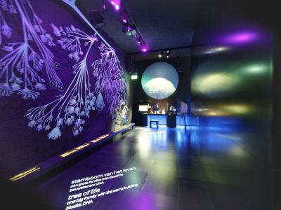 A glowing gallery inside Micropia, Amsterdam