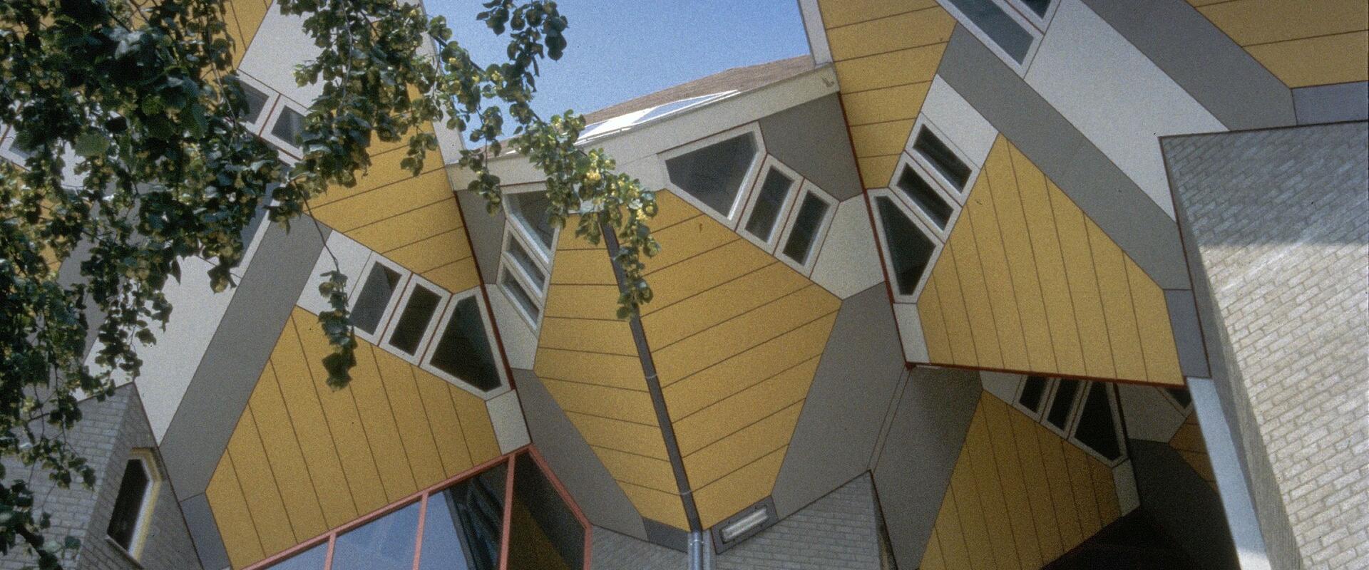 The tilted Cube Houses seen from below, home of the Kijk-Kubus show home
