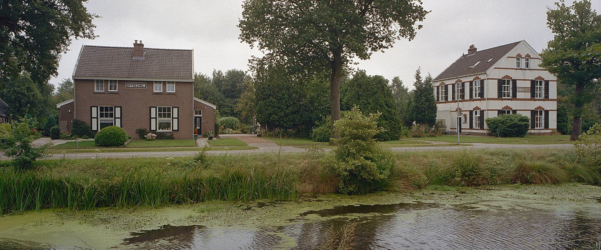 A canal and brick colony houses in Veenhuizen