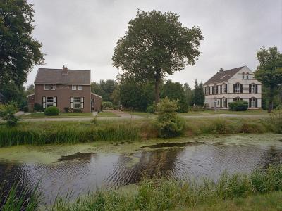 A canal and brick colony houses in Veenhuizen