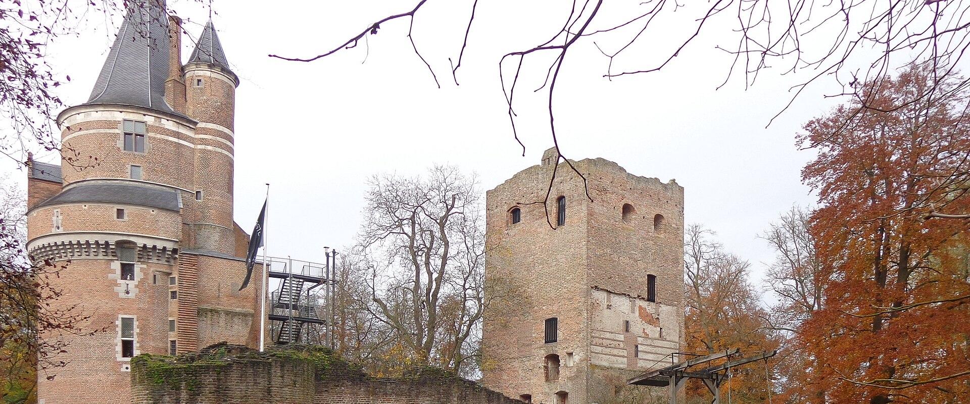 Kasteel Duurstede's round tower and square keep beside the moat in Wijk bij Duurstede