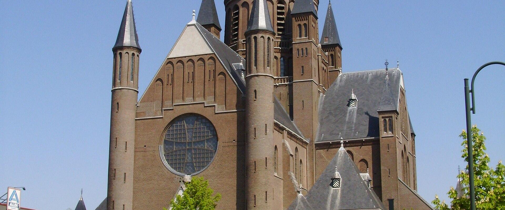The neo-Gothic Sint-Gummaruskerk with its tall spire in Steenbergen