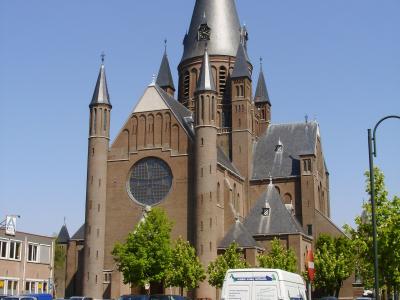 The neo-Gothic Sint-Gummaruskerk with its tall spire in Steenbergen