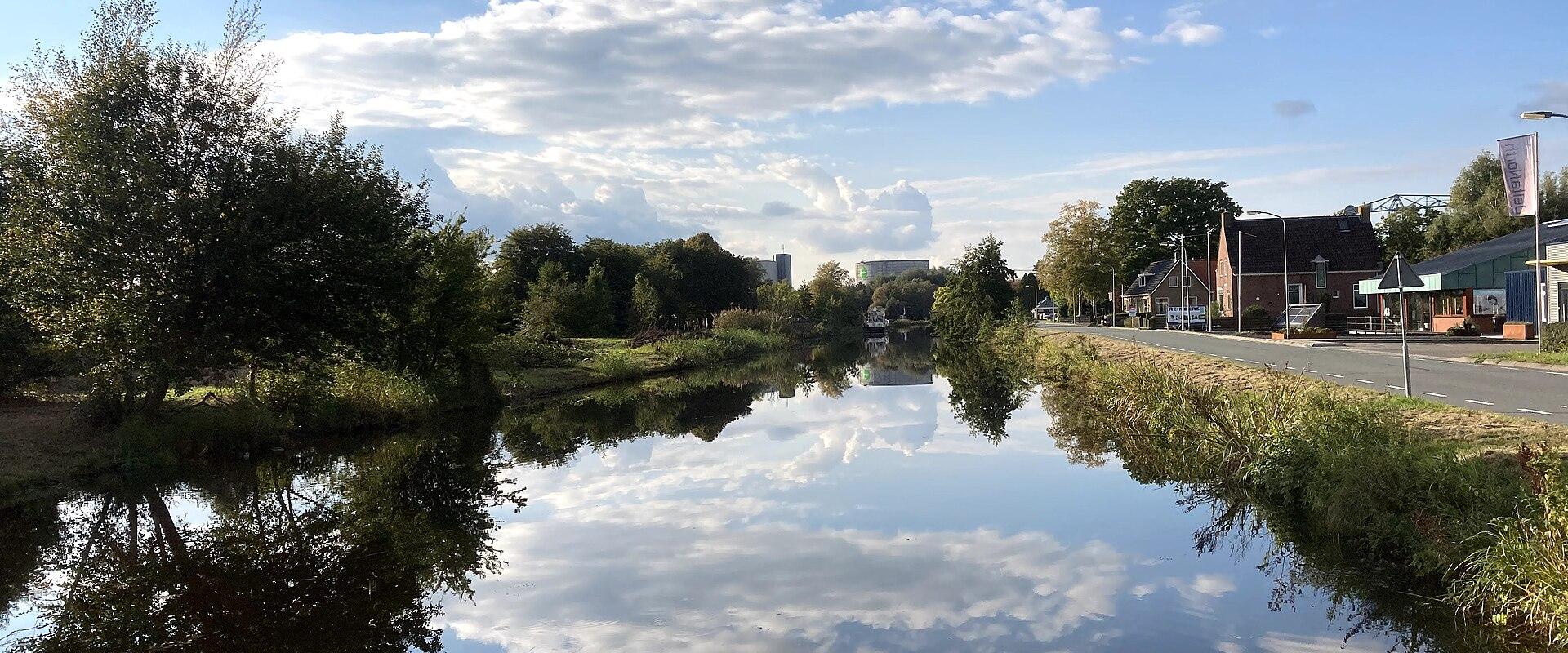 The Oude Winschoterdiep canal reflecting the sky near Hoogezand-Sappemeer