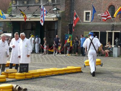 Cheese carriers in white at the Alkmaar cheese market