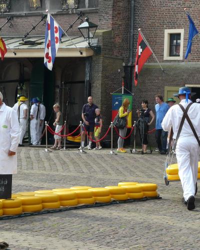 Cheese carriers in white at the Alkmaar cheese market