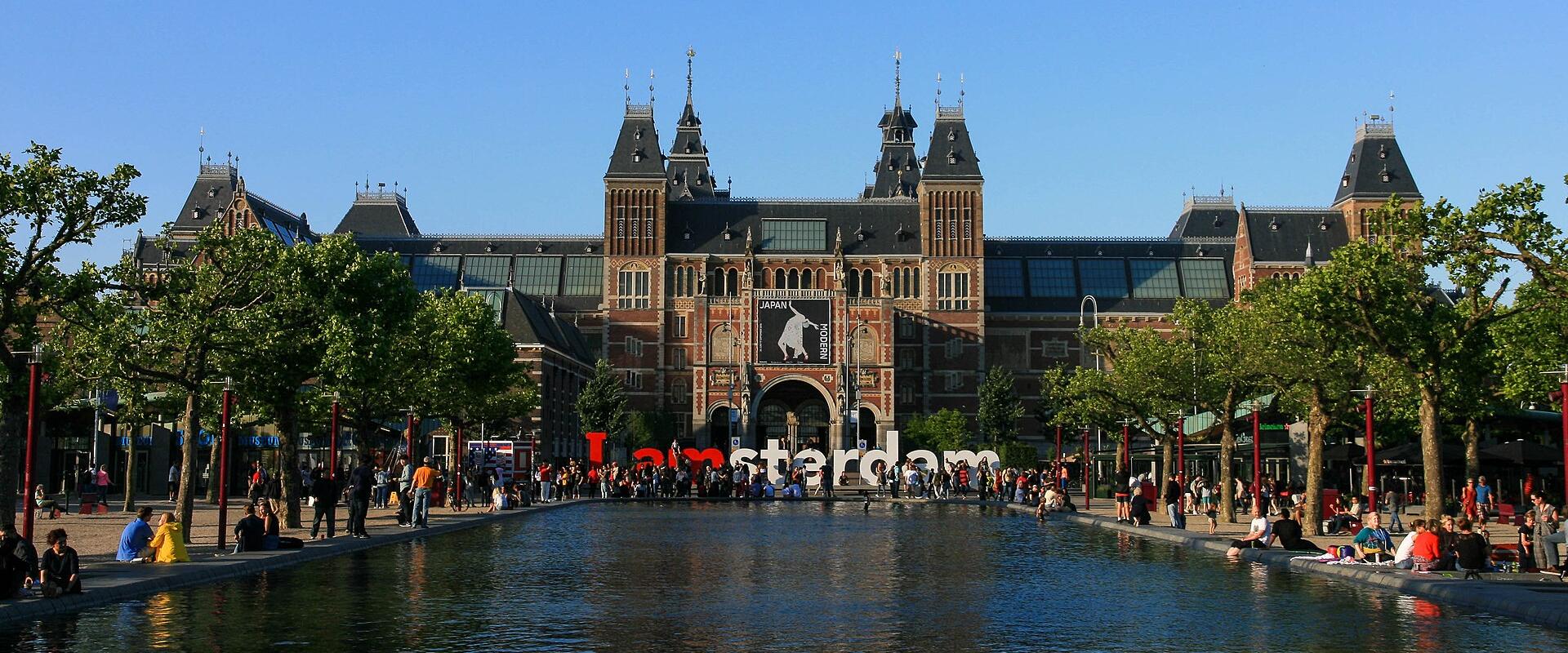 The Rijksmuseum seen across the pond on Museumplein