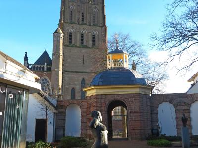 The Stedelijk Museum Zutphen courtyard with the Walburgiskerk tower