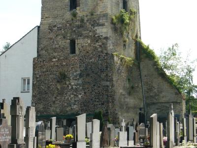 The old church tower of Gulpen standing in the churchyard