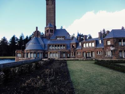 Jachthuis Sint Hubertus by Berlage, with its tall tower, in the Hoge Veluwe