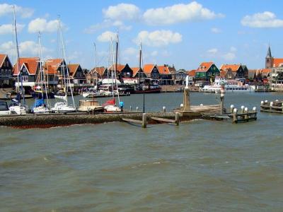 Volendam harbour with moored boats and the row of houses along the Dijk