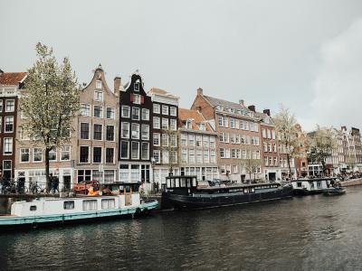 Canal houses and houseboats along an Amsterdam canal