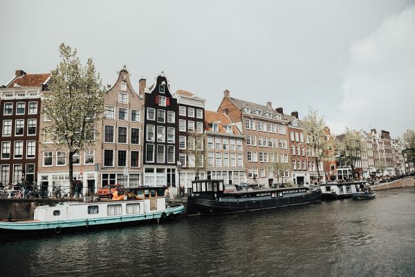 Canal houses and houseboats along an Amsterdam canal