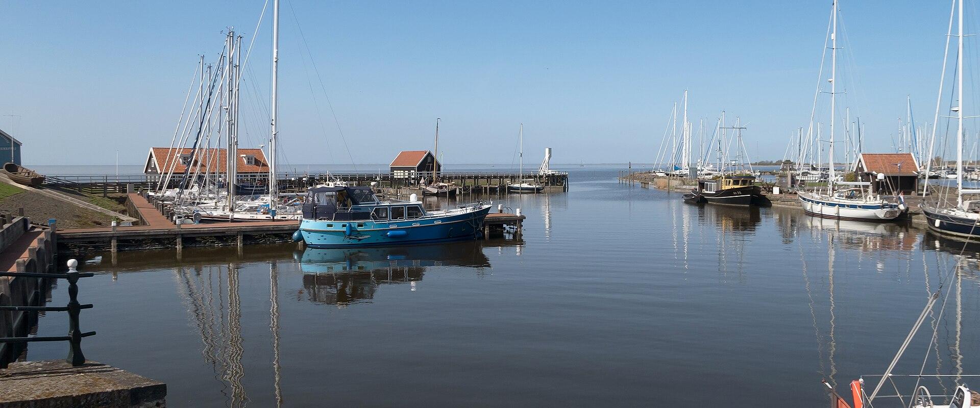 Boats in the harbour of Hindeloopen on a calm day