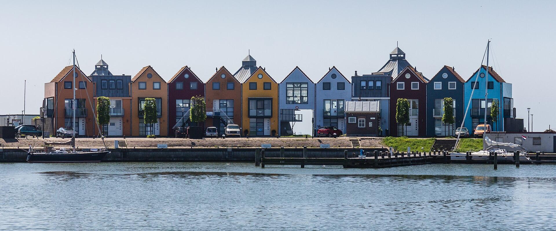 Colourful waterfront houses along the harbour of Stavoren