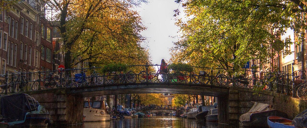 A bridge over a Jordaan canal in Amsterdam in autumn