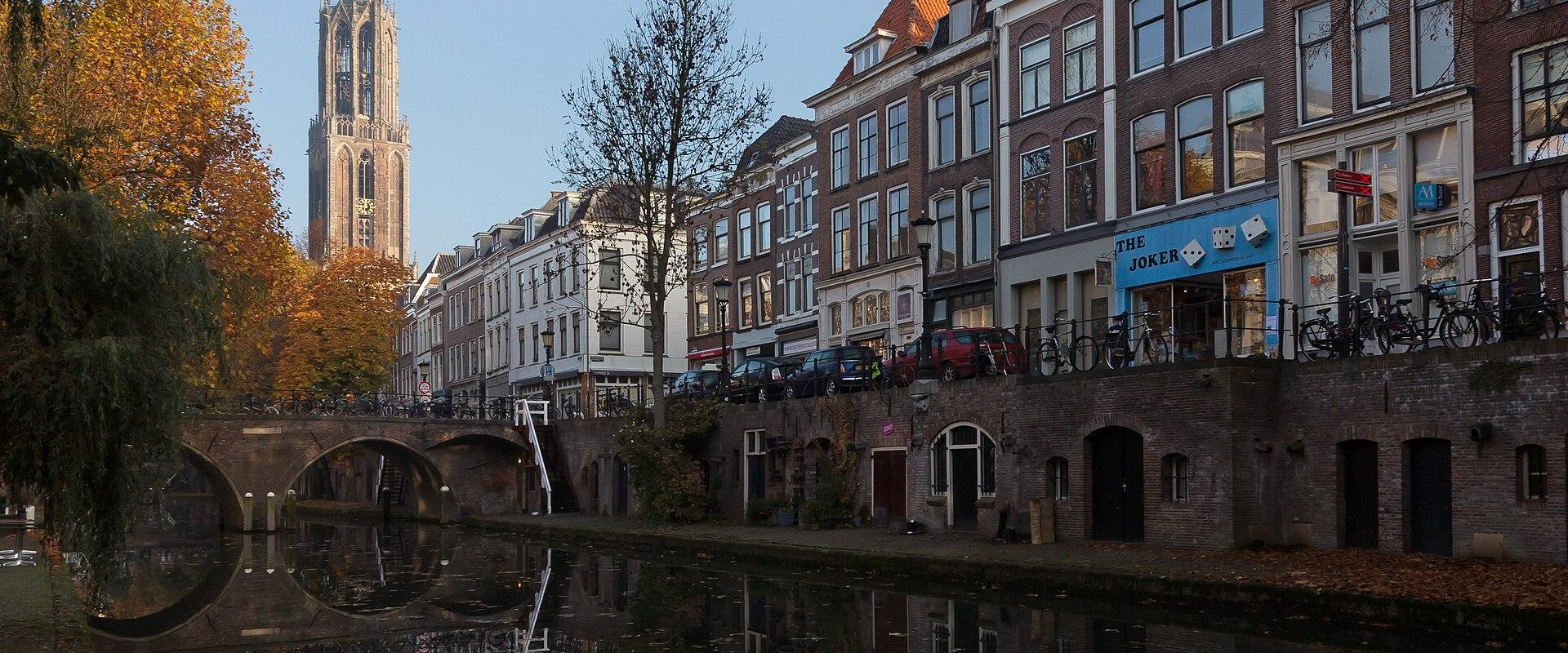 The Oudegracht canal and the Dom Tower in Utrecht in autumn